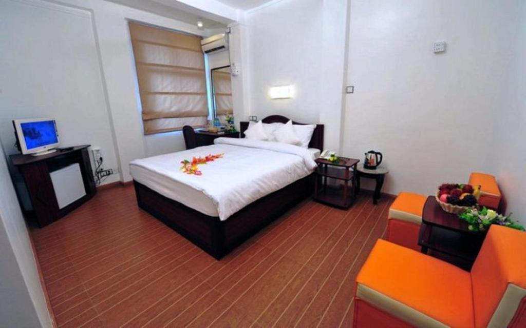 Clover Hotel Rangoon Værelse billede